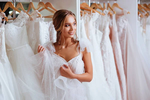 Attractive Young Bride Smiling While Choosing Wedding Dress Modern Wedding Stock Photo