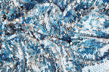 Arka plan payet. arka plan pullu. parlak yüzey aktif. Yanıp sönen ışıklar ile tatil soyut glitter arka plan. Kumaş pullu parlak renkler. Moda kumaş glitter, pullu