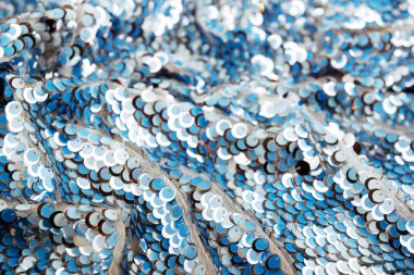 Arka plan payet. arka plan pullu. parlak yüzey aktif. Yanıp sönen ışıklar ile tatil soyut glitter arka plan. Kumaş pullu parlak renkler. Moda kumaş glitter, pullu