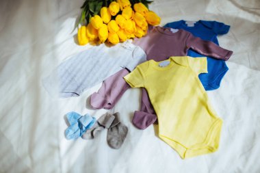 Bebek Giyim Kumaş arka plan üzerinde