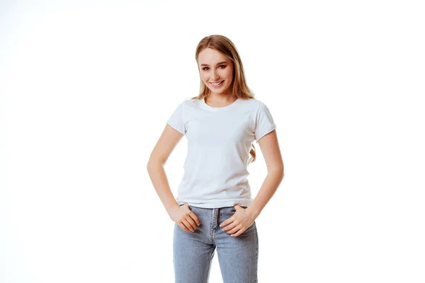 Young woman showing smile, in casual smart clothing, isolated against white background. — Stock Photo, Image