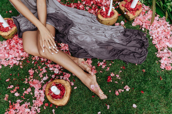 Woman legs in tropical villa