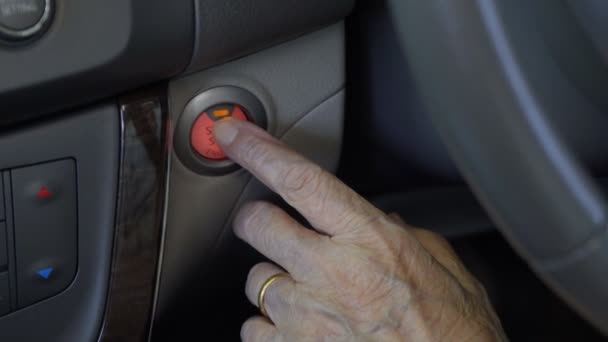 Elderly Woman Hand Push Start Car Engine Button — Stock Video