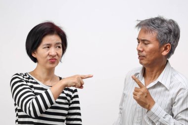 woman pointing her finger against and blame her husband clipart