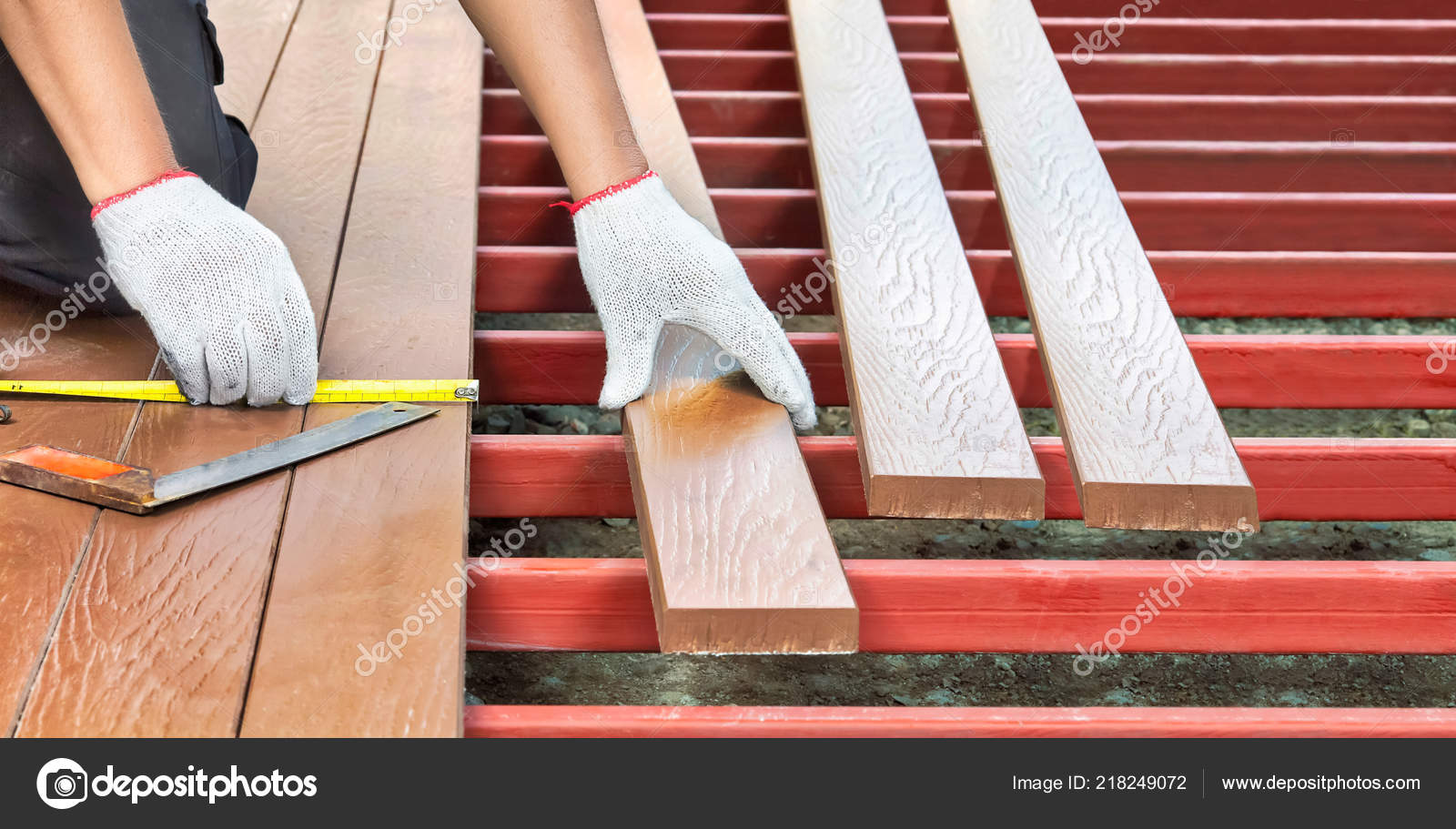 Worker Installing Wood Floor Patio — Stock Photo © toa55 218249072