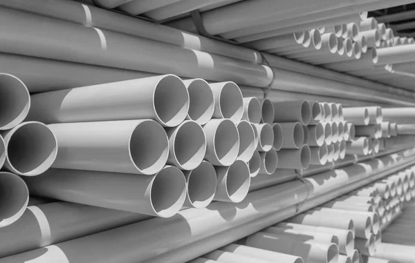 PVC pipe stacked in warehouse — Stock Photo, Image