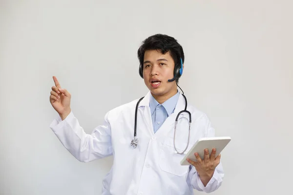 Young Asian Doctor Stethoscope Talking Patient White Background — Stock Photo, Image