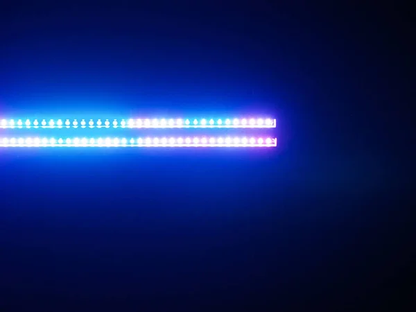 Primer plano en la luz led azul en fondo negro — Foto de Stock