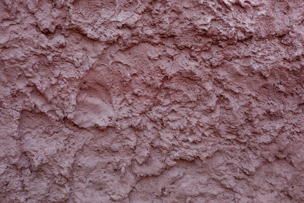 The original dynamic texture of the concrete waves on the wall