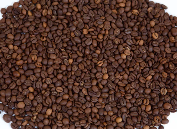 Granos de café primer plano fondo — Foto de Stock