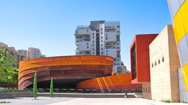 Exhibition hall of modern art and design, made of large metal elements covered with decorative rust of different shades