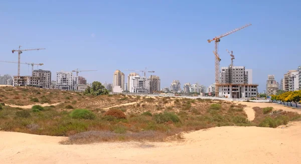 Building yard of Housing construction of houses in a new area of the city Holon in Israel