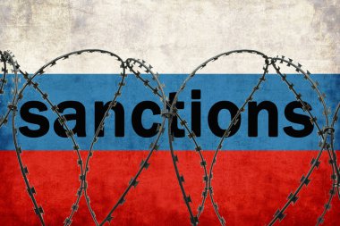 Rus bayrağıyaptırımları üzerindeki yazıt. Dikenli tel ile çitle çevrili