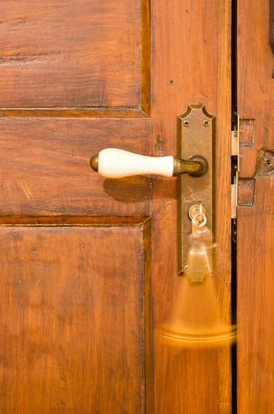 Closeup Shot Wooden Door Handle Moving Key — Stock Photo, Image
