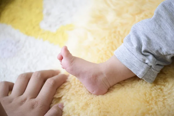 Detail of the little feet of a baby