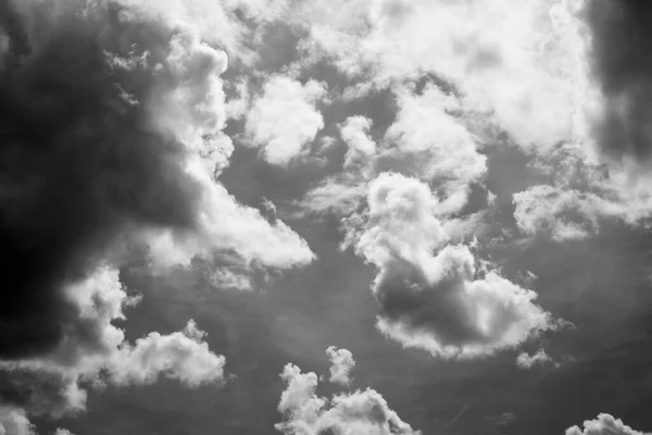 Detail of clouds over the sky, after a rain storm, in black and white.