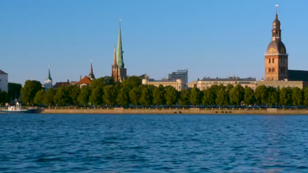 Riverside panorama of medieval European city of Riga in summer sunset light — Stock Video