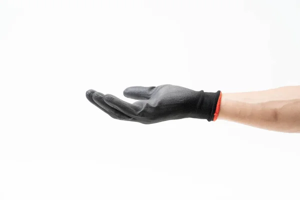 Man hand met zwarte antislip handschoenen op witte achtergrond — Stockfoto