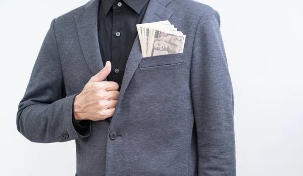 Empresario con billetes de diez mil yenes sobre fondo blanco — Foto de Stock