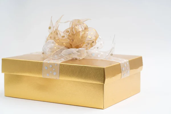 Gold gift box on white background — Stock Photo, Image