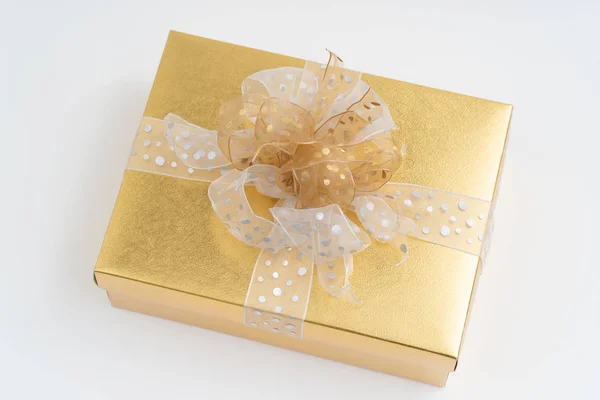 Gold gift box on white background — Stock Photo, Image