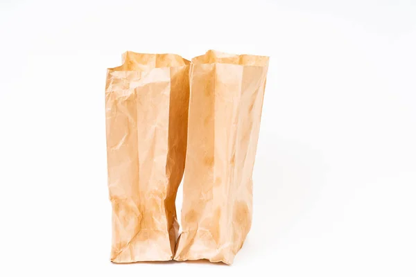 Crumpled brown paper bag on white background — Stock Photo, Image