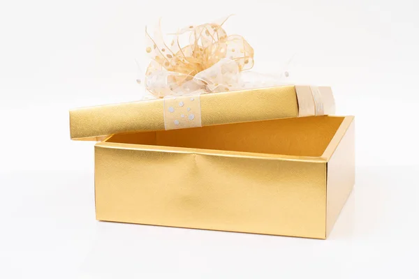 Gold gift box on white background — Stock Photo, Image