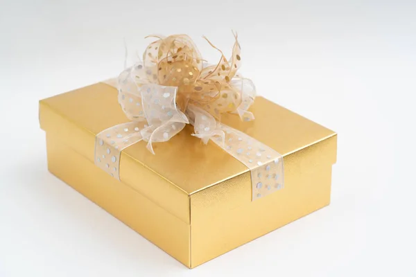 Gold gift box on white background — Stock Photo, Image