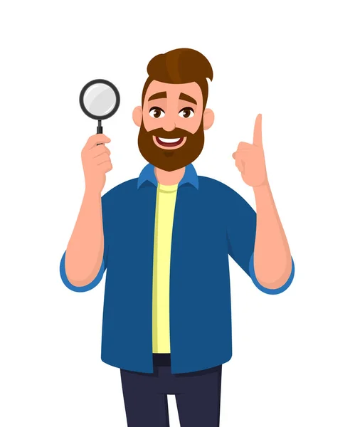 Cheerful bearded young man holding/showing magnifying glass and pointing hand finger up. Search, find, discovery, analyze, inspect, investigation concept illustration in vector cartoon flat style. — Stock Vector