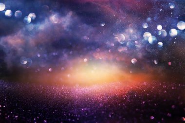 Glitter vintage ışıklar arka plan. pembe, mavi, siyah ve mor. de-odaklı