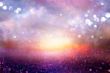 Glitter vintage ışıklar arka plan. pembe, mavi, siyah ve mor. de-odaklı.