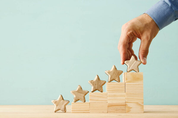 concept image of setting a five star goal. increase rating or ranking, evaluation and classification idea