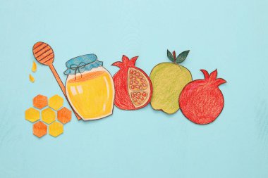 Rosh hashanah (Yahudi yeni yıl tatili) kavramı. Geleneksel semboller şekilleri kağıttan kesilmiş ve boyalı
