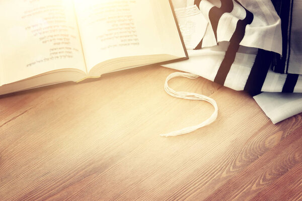 Prayer Shawl - Tallit and Prayer book jewish religious symbols. Rosh hashanah (jewish New Year holiday), Shabbat and Yom kippur concept