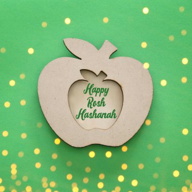 Rosh hashanah (Yahudi yeni yıl tatili) kavramı. Geleneksel sembolü, dekoratif ahşap elma