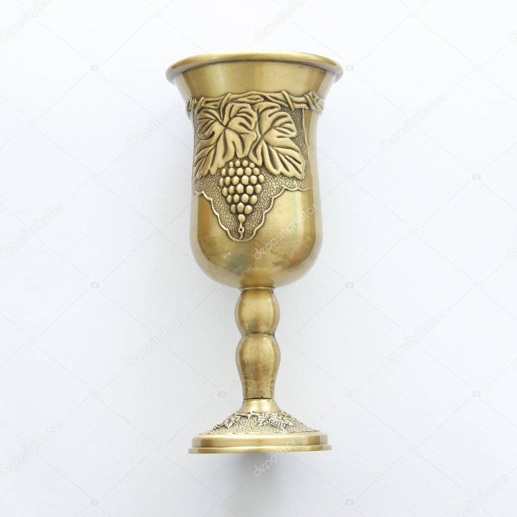 Top view image of jewish wine cup for wine. passover holiday and shabbat concept