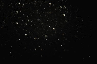 siyah ve gümüş ışık arka plan parıltı. de-odaklı