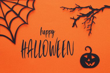 Cadılar Bayramı tatil kavramı. Turuncu arka plan üzerinde örümcek ağı. Üstten görünüm, düz yatıyordu