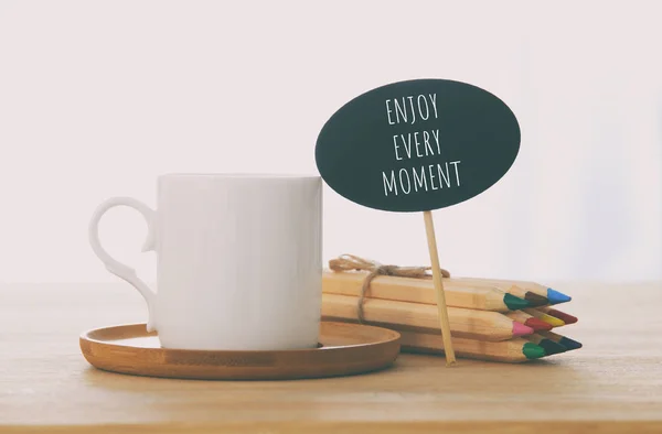 Sign Text Enjoy Every Moment Next Cup Coffee Wooden Table — Stock Photo, Image