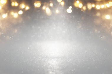 Glitter vintage ışıklar arka plan. Gümüş, altın ve gri. de-odaklı