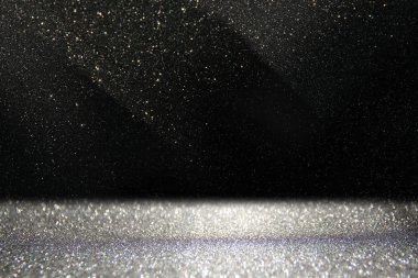 Glitter vintage ışıklar arka plan. siyah ve gümüş. de-odaklı