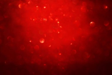 Kırmızı, siyah ve altın ışık arka plan parıltı. defocused