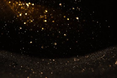 Glitter vintage ışıklar arka plan. siyah ve altın. de-odaklı