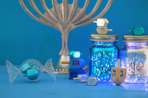 image of jewish holiday Hanukkah background with menorah (traditional candelabra)