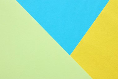 Üç tonları pastel arka plan. mavi, yeşil ve sarı düz lay, görünümü Top