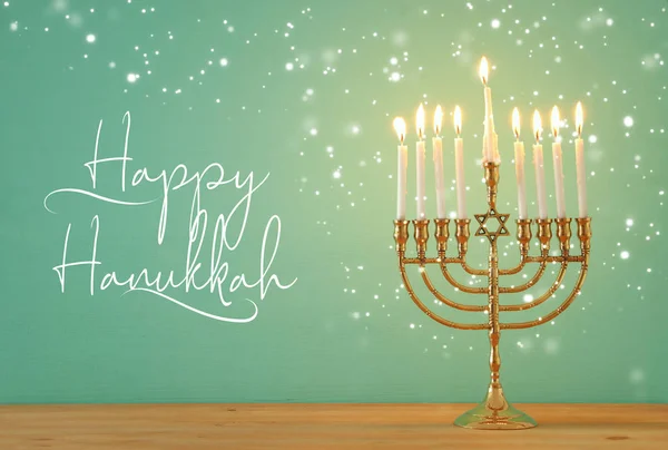 image of jewish holiday Hanukkah background with menorah (tradit