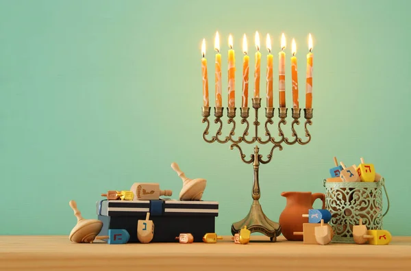 image of jewish holiday Hanukkah background with menorah (traditional candelabra)