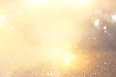 Glitter vintage ışıklar arka plan. Gümüş ve altın. de-odaklı
