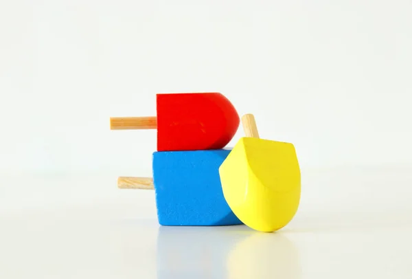 Image of jewish holiday Hanukkah with wooden dreidels colection