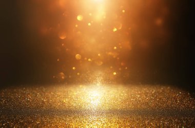Glitter vintage ışıklar arka plan. siyah ve altın. de-odaklı